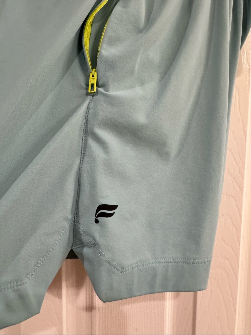 Fabletics Light Teal Athletic Shorts with Neon Yellow Accents - Picture 2 of 9